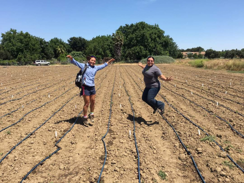 Jumping for joy at the Student farm getting ready to plant some SCOPE peppers with Saarah Kuzay