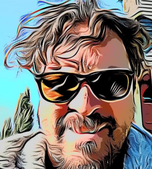 Psychedelic filtered selfie of a man with medium length brown hair wearing sunglasses.