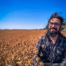 LFB profile picture, smiling next to the safflower, enjoying the wind. 